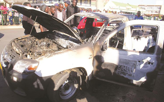 A Zimbabwe Broadcasting Corporation pick-up truck that was torched by rowdy MDC-T youths during an illegal demonstration in Harare yesterday