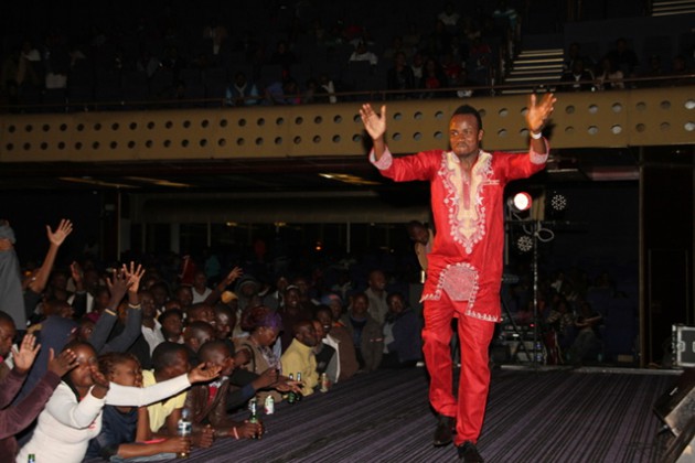 Sam Dondo on stage at HICC