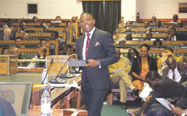  Parliamentary Portfolio Committee on Youth, Indigenisation and Economic Empowerment chairman and Gokwe-Nembudziya legislator Cde Justice Mayor Wadyajena presents a report on Marange-Zimunya Community Share Ownership Trust in Harare yesterday. — Picture by Tawanda Mudimu