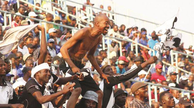 For Highlanders, it’s the vintage image worth a thousand words…Sadly, football super fan Augustine Moyo is no more