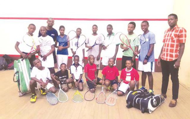STARS OF THE FUTURE . . . Coaches and junior players from the Zimbabwe Squash Academy Trust pose for a group photograph ahead of their 7th anniversary tournament. In the picture are (kneeling, from left) Pride Masiiwa, Elwin Mupangavanhu, Moreblessed Chitima, Elton Mukumba, Davison Tanaka Chatiza, Anesuishe Marange; and (standing, from left) Dilon Madzivanyika, Anesu Mushonga, Mashumba Mukumba (coach), Moreblessing Tirita, Shayne Chitima, Blessington Kufa, Tafadzwa Chipato, Byron Chipakwe, Perfect Masiiwa and Talent Whisker Mushunje (coach). 
