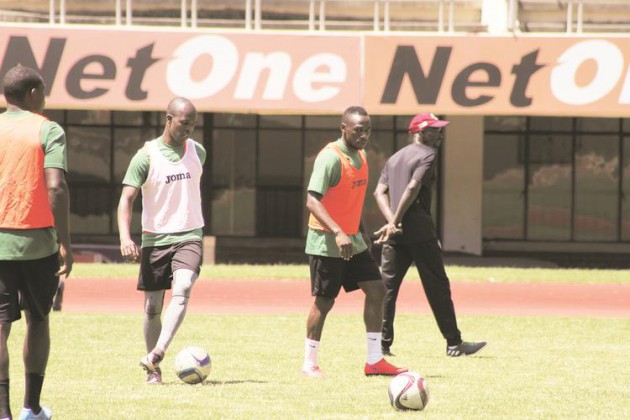 EYES ON THE BALL . . . Knowledge Musona and Onismor Bhasera go through their paces at the National Sports Stadium ahead of today’s big battle. — (Picture by Kudakwashe Hunda)