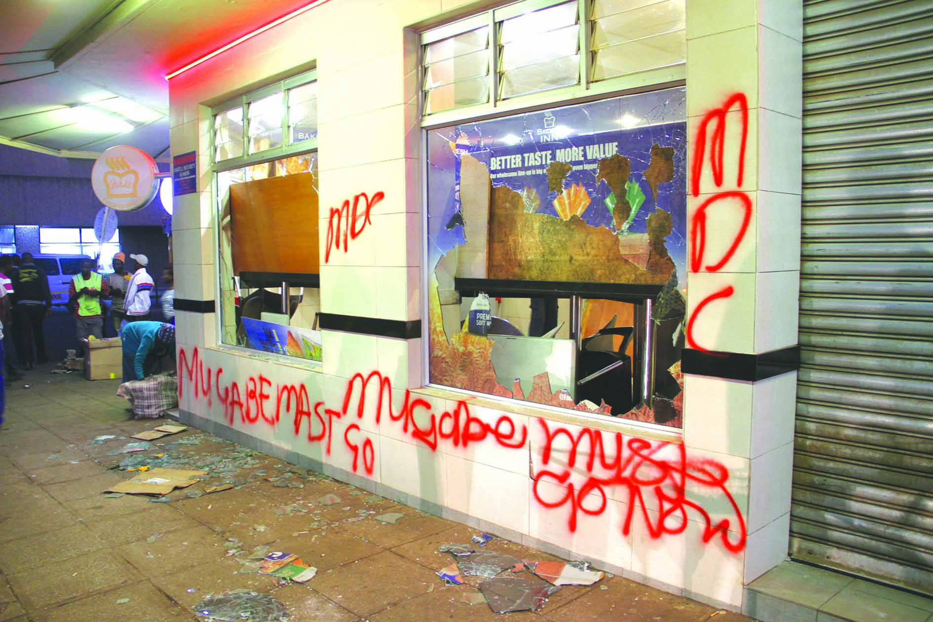 Opposition thugs unleash terror, loot shops