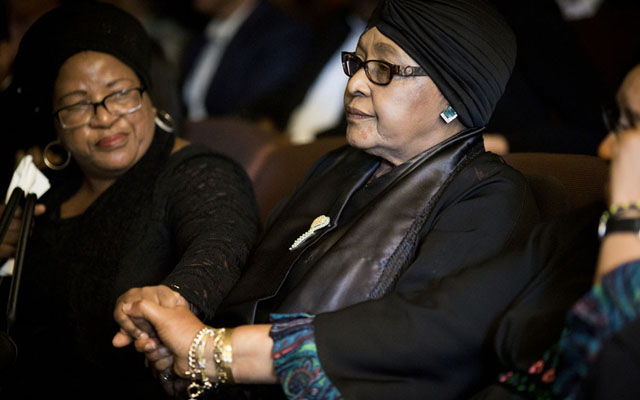 Winnie Mandela (right), ex-wife of the late former South African president Nelson Mandela, attends a memorial service in honour of anti-apartheid stalwart Ahmed Kathrada (inset) in Johannesburg yesterday