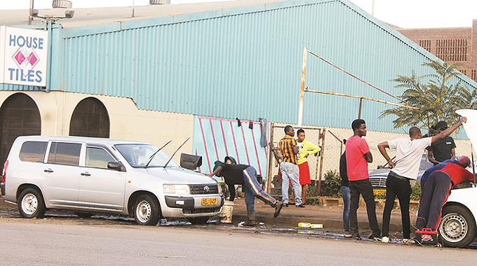 Act on illegal car washers, council told