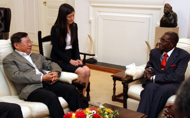 President Mugabe meets R and F company president Mr Zhang Li, who was in the company of an interpreter Ms Yi Chen at State House in Harare yesterday. — (Picture by Tawanda Mudimu)