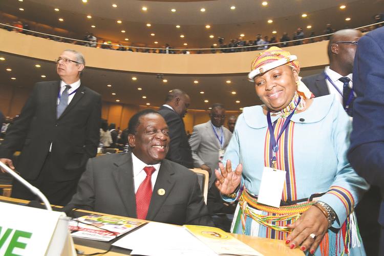 President Mnangagwa speaks to South Africa Defence and Military Veterans Minister Nosiviwe Mapisa-Nqakula at the 30th African Union (AU) Summit in Addis Ababa, Ethiopia, yesterday. — (Picture by Joseph Nyadzayo)