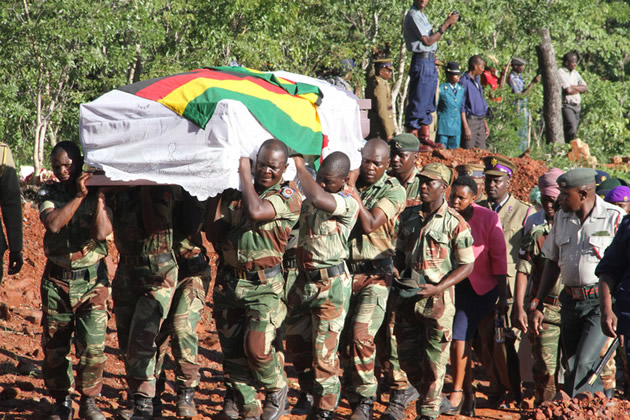 Pall-bearers carry a casket bearing the body of Snr Assist Comm Mubaiwa to his final resting place at the MIdlands Provincial Heroes Acre in Gweru on Tuesday. - Picture by Tawanda Mudimu