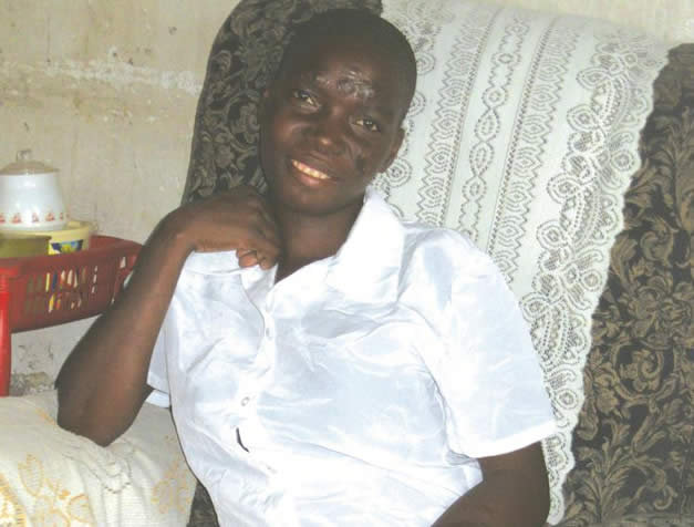 Joyline finds courage to break into a radiant smile despite the excruciating pain she has been going through.