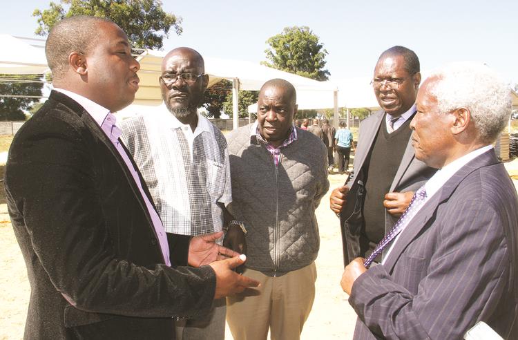 zanu-pf Youth League Secretary Kudzanayi Chipanga briefs Defence Minister and zanu-pf Politburo member Dr Sydney Sekeramayi, Minister of State for Mashonaland East Provincial Affairs Retired Brigadier-General Ambrose Mutinhiri (second from right), Mashonaland East Provincial Chairman Mr Bernard Makokove (third from right) and Marondera Central MP Lawrence Katsiru (second from left) on the state of preparedness ahead of an interactive meeting with President Mugabe slated for tomorrow. — (Picture by Kudakwashe Hunda)