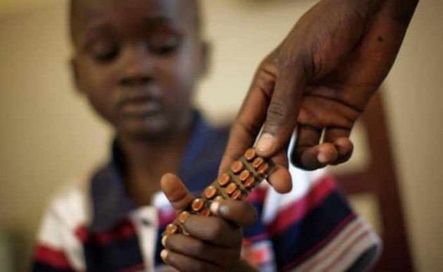 A child receives tuberculosis medicine. - (Picture: Brian Sokol)