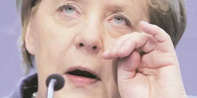 IN SHOCK . . . Angela Merkel