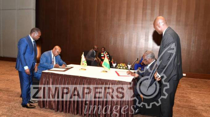 Zim, Guinea sign four agreements