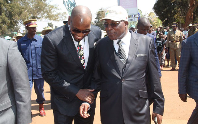 Information, Media and Broadcasting Services Minister Christopher Mushohwe speaks to Air Zimbabwe Chief Operations Officer Simba Chikore at the Harare Agricultural Show yesterday. - (Picture by Shelton Muchena)