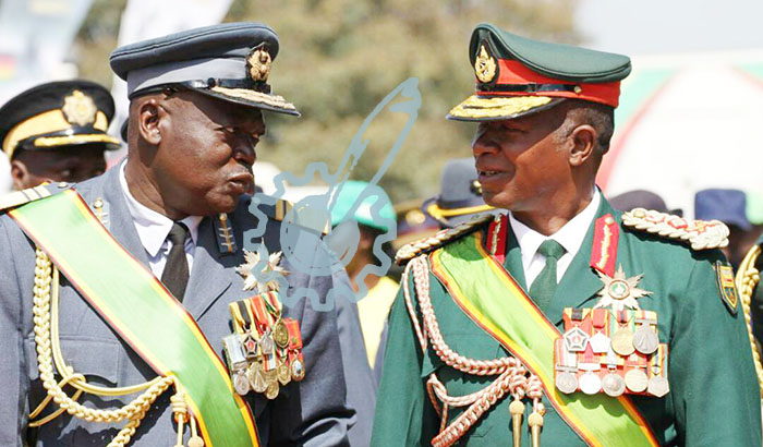Air Force of Zimbabwe Commander Air Marshal Perrence Shiri (left) chats with Zimbabwe National Army Commander Lieutenant-General Philip Valerio Sibanda