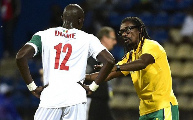 LIONS OF TERANGA . . . Senegal’s head coach Aliou Cisse (right) speaks to midfielder Mohamed Diame during their 2017 African Cup of Nations Group B match against Algeria, in Franceville, on January 23. Cisse will be out to plot Cameroon’s downfall in tonight’s crunch quarter-final tie