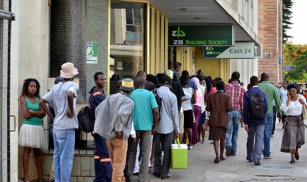 The country’s productive sector is left poorer because the majority of workers are having to spend hours in bank queues trying to withdraw their salaries which they are given in drips and drabs