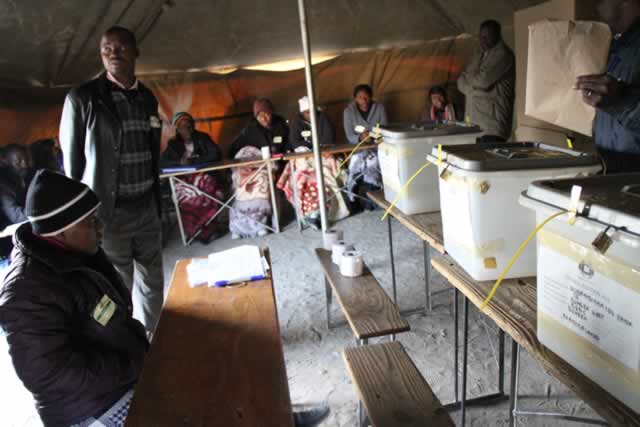 Election tools . . .polling officers ready to roll earlier today at Buhera Shopping center polling station.