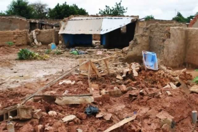 Houses destroyed by flooding on the outskirts of the Burkina Faso capital, Ouagadougou. — IRIN