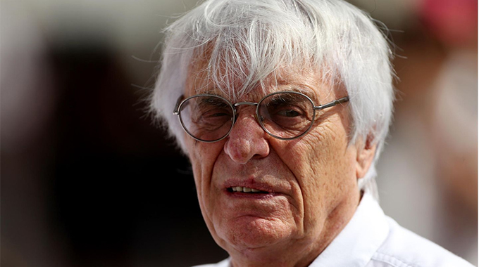 Ecclestone defends Putin, takes a dig at Hamilton