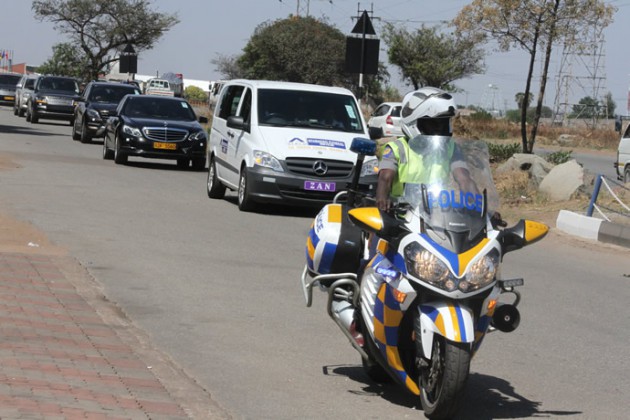 The hearse carrying Zanele's body being escorted to Nyaradzo funeral parlour in Harare today.