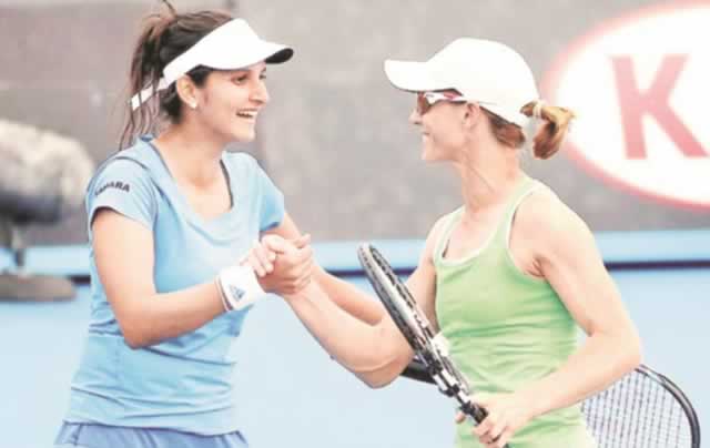 DOUBLE TROUBLE . . . Zimbabwe’s Cara Black (right) and her Indian partner Sania Mirza have reason to celebrate after winning the Pan Pacific title in Tokyo, Japan, on Saturday