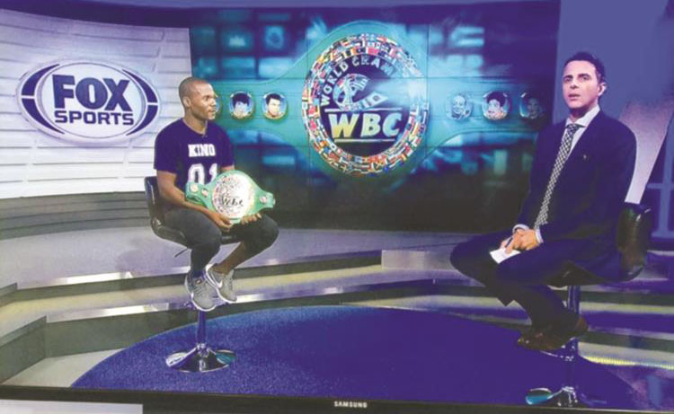 HOGGING THE LIMELIGHT . . . Zimbabwe’s boxing superstar Charles Manyuchi is an oasis of confidence as he is interviewed by Fox Sports television in Singapore ahead of his mega fight tomorrow
