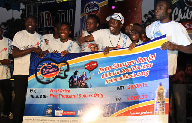 AND THE WINNERS ARE . . . Afro-fusion group Black Sight pose with the $5 000 cheque after being crowned Chibuku Road to Fame 2015 champions at the weekend