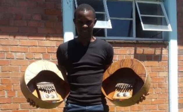 Chikumbirike showing his mbira instruments