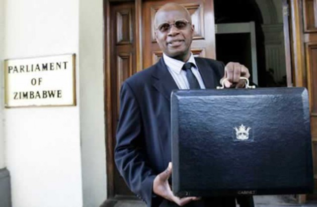 FLASHBACK. . . Then Acting Finance Minister Chinamasa poses for a photo before presenting the 2009 National Budget