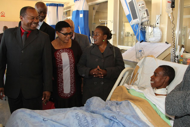 File Pic: Chitungwiza Central Hospital chief executive officer Dr Obadiah Moyo (left) in the company of legislators from the Parliamentary Portfolio Committee on Health and Child Care, shares a lighter moment with Ms Portia Tapfumanei after the successful removal of a 25kg cyst from her abdomen