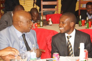 Dr Philip Chiyangwa (left) chats to executive producer of MOB Simanga Zhou