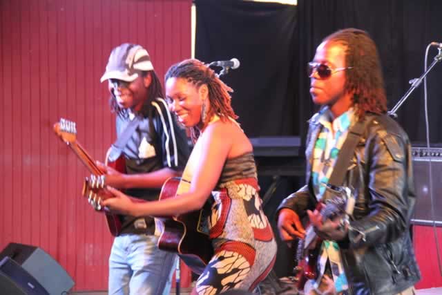 Claire Nyakujara (centre) leads her band in a performance at the Book Cafe