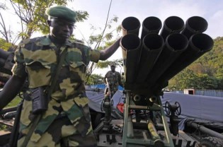 Gunfire erupted at the DRC television station  premises near parliament as well as the international airport and the main military base in Kinshasa, as armed youths believed to be loyal to a Kabila rival took several reporters hostage 