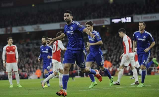Chelsea striker Diego Costa celebrates his 23rd-minute goal against Arsenal after poking a Branislav Ivanovic cross into the net. — Mailonline