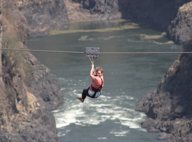Candy sliding across Zambezi river  in Victoria Falls
