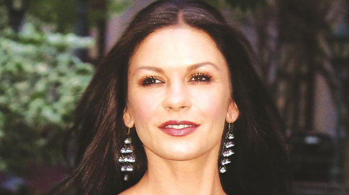 Catherine Zeta-Jones shows off her piano skills