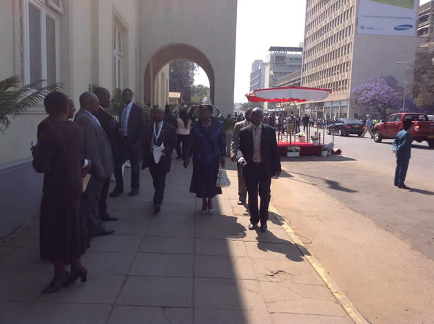 Police conduct spot searches of people attending the opening of the parliament
