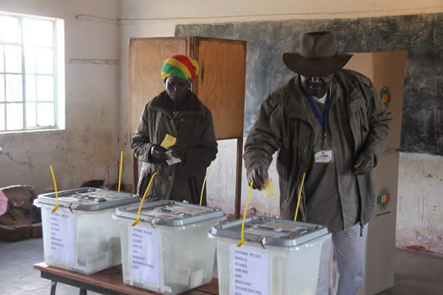 Cde Simbaneuta Mudarikwa ZANU-PF candidate casting his ballot at Chitimbe Primary this Morning in Uzumba