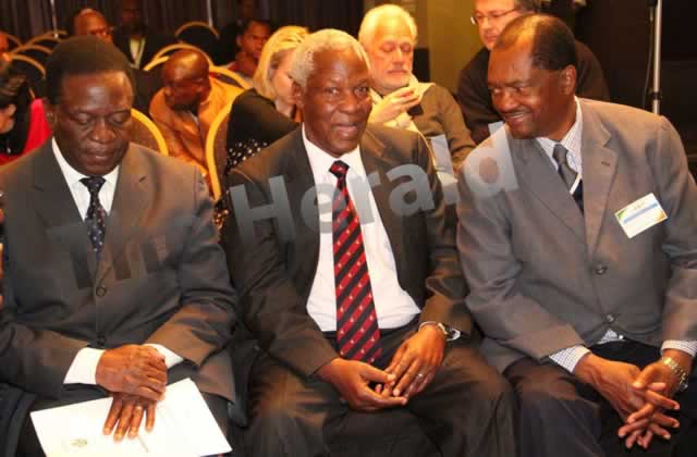 Comrades Emmerson Mnangagwa, Sydney Sekeramayi and Rugare Gumbo of ZANU PF awaiting the announcement of Presidential results in Harare