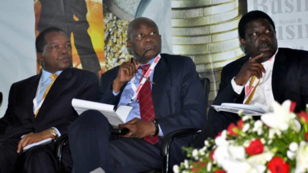 Finance and Economic Development Minister Patrick Chinamasa (centre), flanked by Reserve Bank of Zimbabwe Governor Dr John Mangudya (left) and Minister of Industry and Commerce Mike Bimha, follows proceedings at the Zimbabwe Trade and Investment breakfast meeting in Sandton, South Africa, last Friday