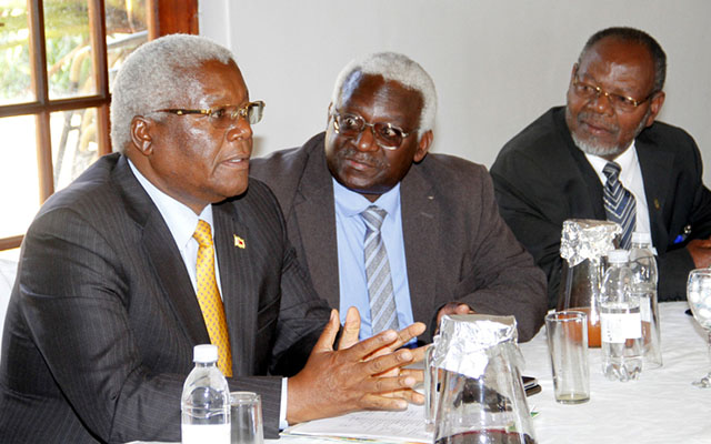 Home Affairs Minister Dr Ignatius Chombo, Mr Alois Matongo and Censorship board Chairman Mr Aeneas Chigwedere during a workshop in Harare yesterday. — (Picture by John Manzongo).