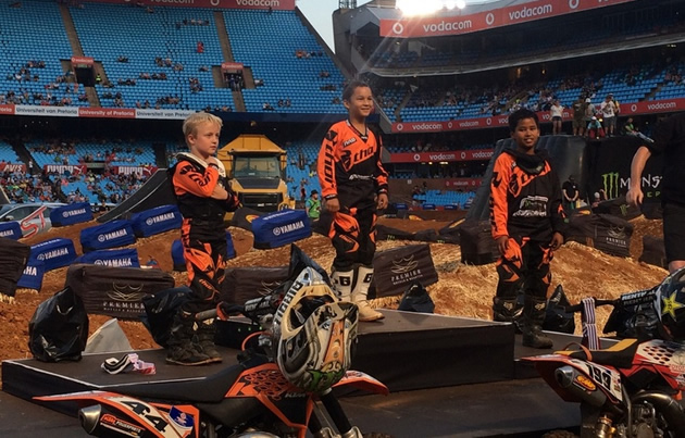 A STAR IN THE MAKING . . . Young Zimbabwean champion motocross rider Daiyaan Manuel (centre) proudly stands at the top of the podium flanked by South Africa’s James Thompson (left) and James Blake from Swaziland after sweeping to victory in the 50cc Class during last weekend’s first-ever Monster Energy Supercross Africa event at Loftus Versfeld Stadium in Pretoria, South Africa