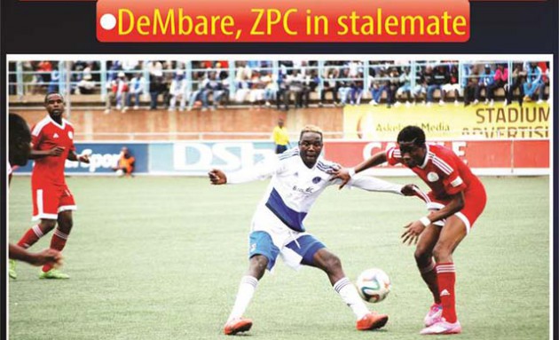 BREAK DANCE . . . Dynamos forward Roderick Mutuma (left) desperately holds onto ZPC Kariba defender Sylvester Appiah as he tries to stay on his feet during yesterday’s match at Rufaro