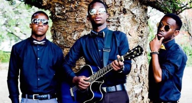 Zim Got Talent 2014 winner Divine Chitubura (centre) and his group the Afro Rythmn