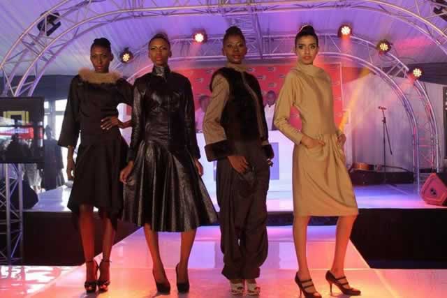 Models showcase various designs on the ramp during the Durban July Fashion show