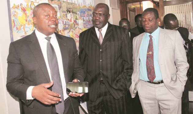 Namibian Minister of Information and Communication Technology Cde Tjekero Tweya with Zimpapers Group Chief Executive Officer Mr Pikirayi Deketeke and Deputy Minister of Information Communication Technology and Courier Services Dr Win Mlambo during a tour of The Herald yesterday. — (Picture by John Manzongo)