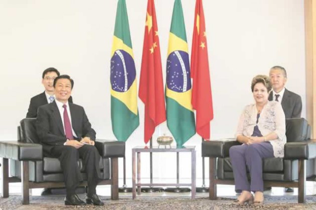  Brazilian President Dilma Rousseff (front right) meets with Chinese Vice President Li Yuanchao (front left), who is with as special representative of Chinese President Xi Jinping, in Brasilia, capital of Brazil. — Xinhua.