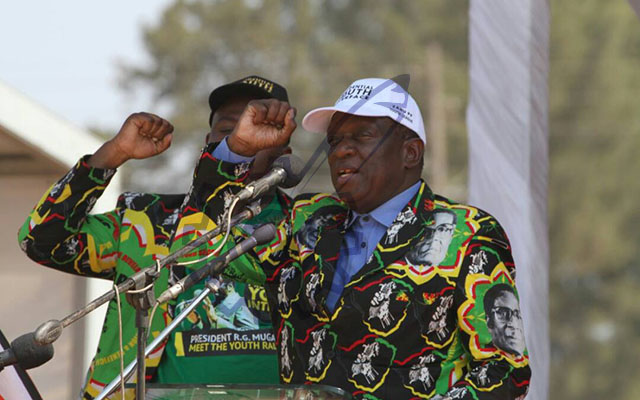 Vice President Mnangagwa chanting party slogan earlier in the day alongside Cde Chipanga ahead of President Mugabe's address at the Midlands Presidential youth Interface Rally in Gweru, September 1, 2017.