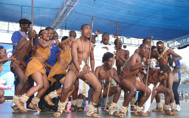 Ezemnyama members celebrate after winning the prize
